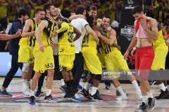 Fenerbahce's players celebrate winning  the first place basketball match between Fenerbahce and Olympiacos at the Euroleague Final Four basketball matches at Sinan Erdem Sport Arena, on May 21, 2017, in Istanbul.  / AFP PHOTO / Bulent Kilic        (Photo credit should read BULENT KILIC/AFP via Getty Images)