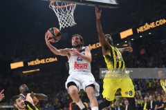 Fenerbahce's Ekpe Udoh (R) tries to stop Real Madrid's Sergio Llull (L) during the semi-final basketball match between Fenerbahce Ulker vs Real Madrid at the Euroleague Final Four basketball matches at Sinan Erdem sport Arena on May 19, 2017 in Istanbul.  / AFP PHOTO / BULENT KILIC        (Photo credit should read BULENT KILIC/AFP via Getty Images)